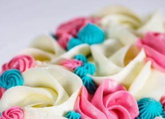 Birthday Cake : this pink and blue cake features a buttercream watercolor technique, chocolate g…