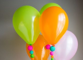 Birthday Decoration : DIY balloon craft idea – string colored foam balls from the balloons for extra c…