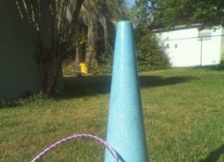 Birthday Decoration : hula hoop toss for unicorn party. this was an orange street cone, i painted and …