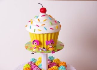 Birthday Decoration : I made this giant cupcake and mini cupcake tower to go with the sweet-shoppe the…