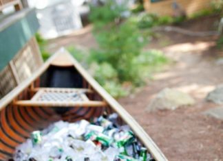 Birthday Decoration : Use a canoe to chill beverages at an outdoor party. And wow, that's a lot of…