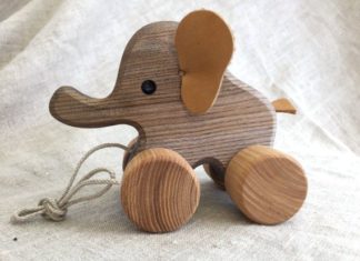 Birthday Gifts Inspiration : Pull along toy Elephant, a joyfully looking wooden animal on wheels with a strin…