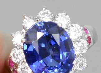 Birthday Gifts Ideas : A Halo 5.7CT Oval Cut Blue Sapphire with Red Ruby and White Sapphire Accents Flo…