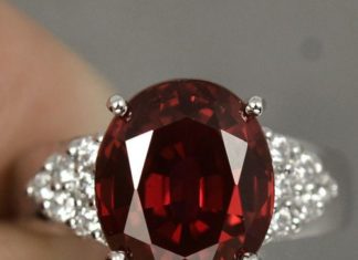 Birthday Gifts Ideas : A Natural 6.97CT Oval Cut Red Garnet with Round Diamond Cut White Sapphire Accen…