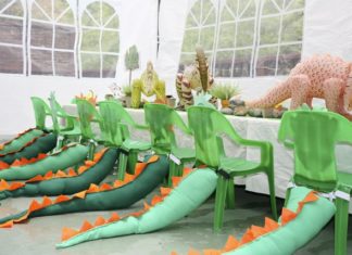 Birthday Party Inspiration : Chairs with tails at a Dinosaur Party #dinosaur #partytable