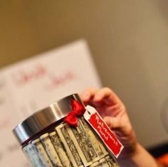 Birthday Gifts Inspiration : Fifty one dollars bills rolled up and stacked inside a clear jar. See more 50th …